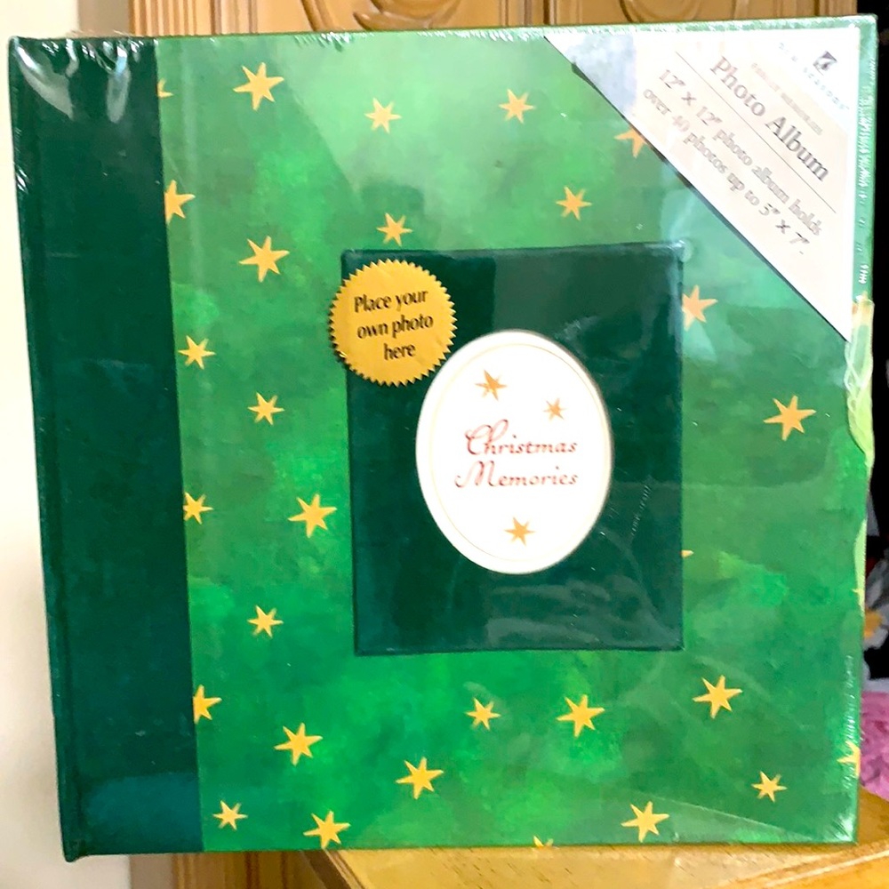 Photo Album for Christmas 12”x12” holds 40  5”x7” new in plastic .